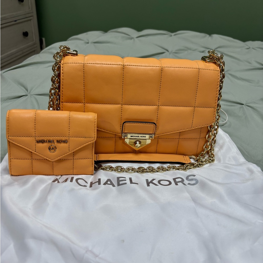Micheal Kors leather shoulder bag with matching wallet